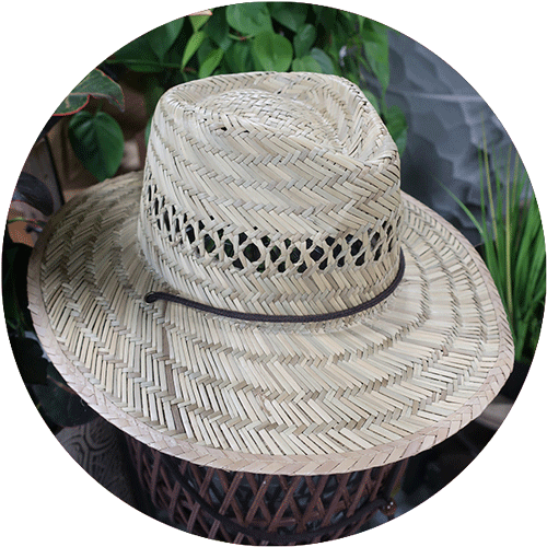 A classic straw hat with wide brim, sith a brown string for tightening to head.